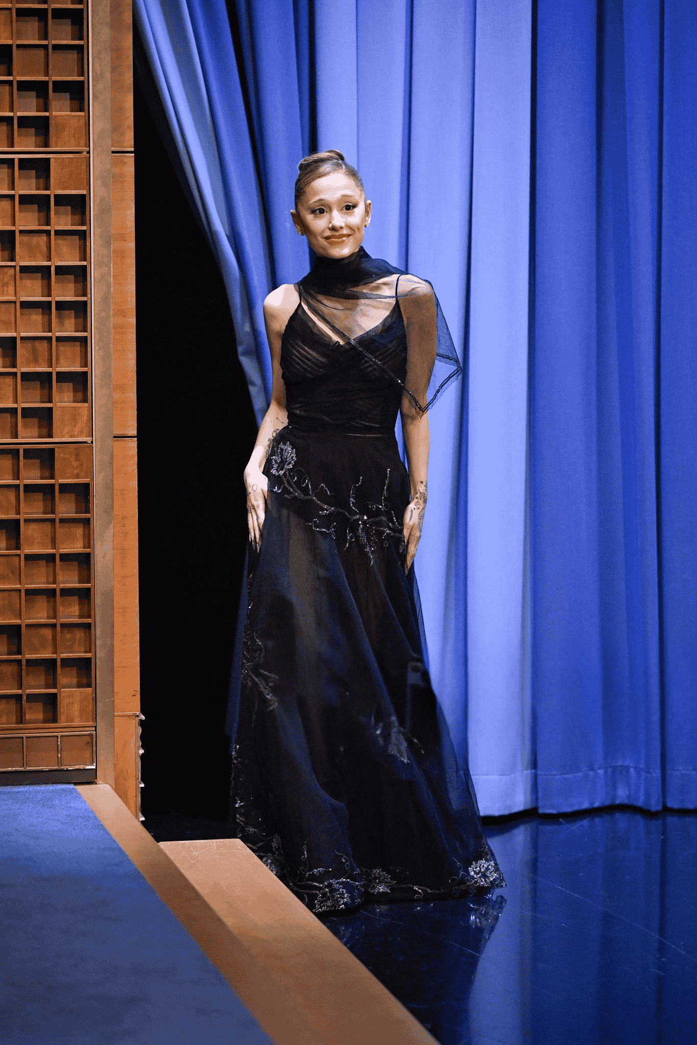 Ariana Grande’s Black Botanical One-Shoulder Gown Breakdown