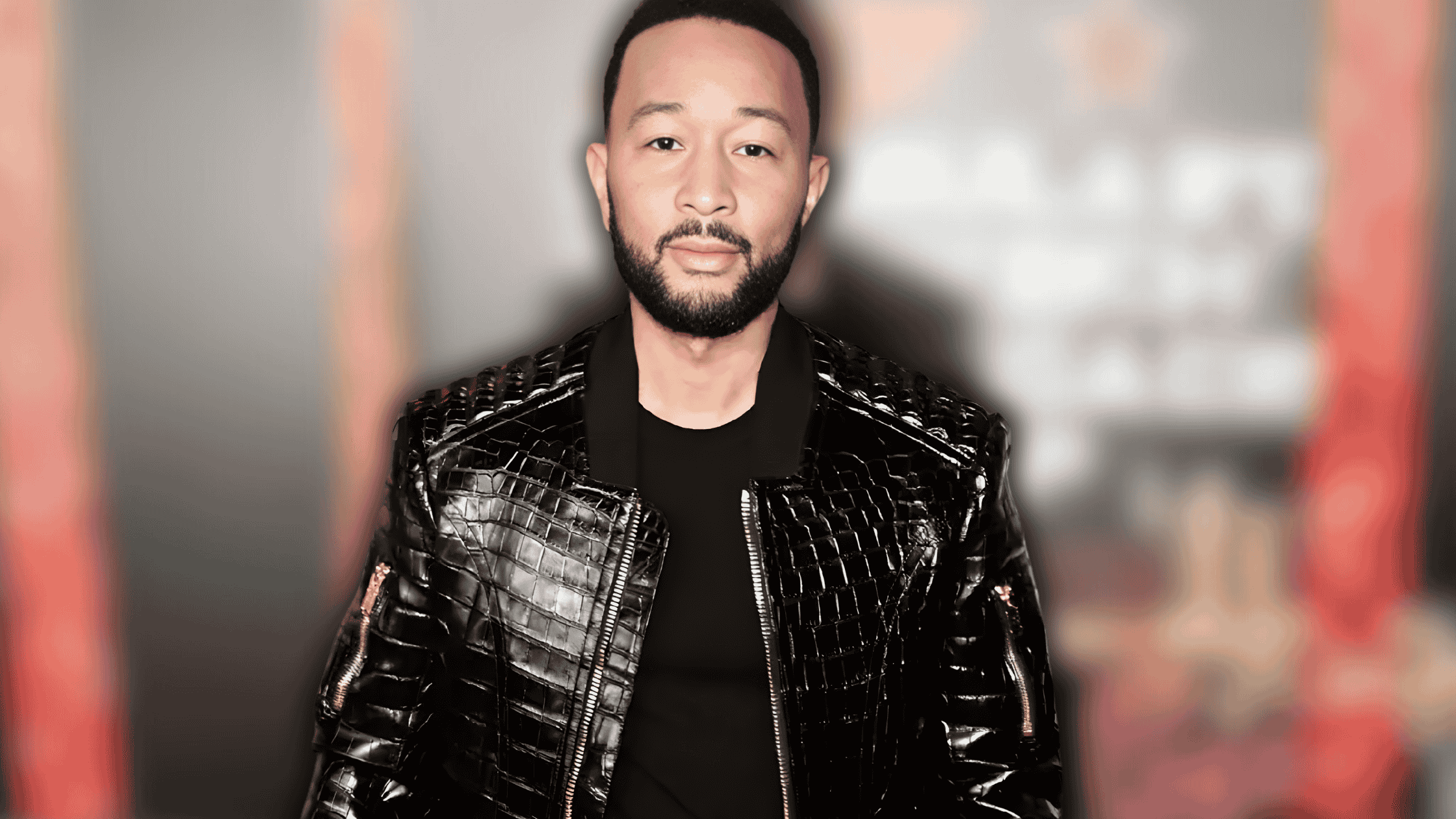 john-legend-in-a-glossy-crocodile-embossed-black-leather-jacket-at-the-f1-las-vegas-grand-prix