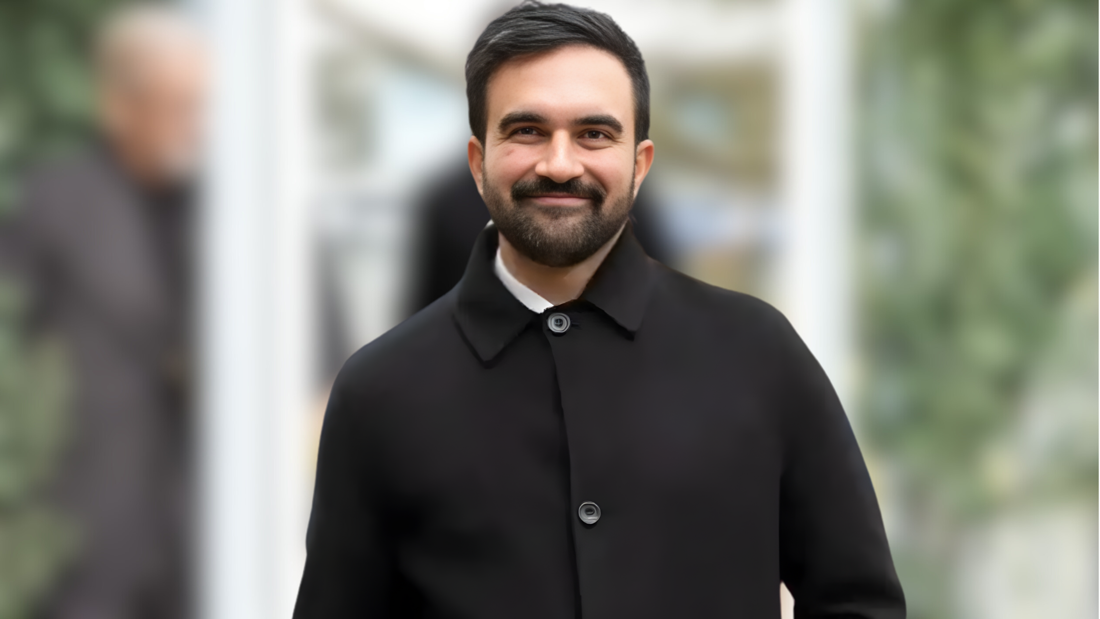 zohran-mamdanis-black-wool-coat-new-york-city-appearance-